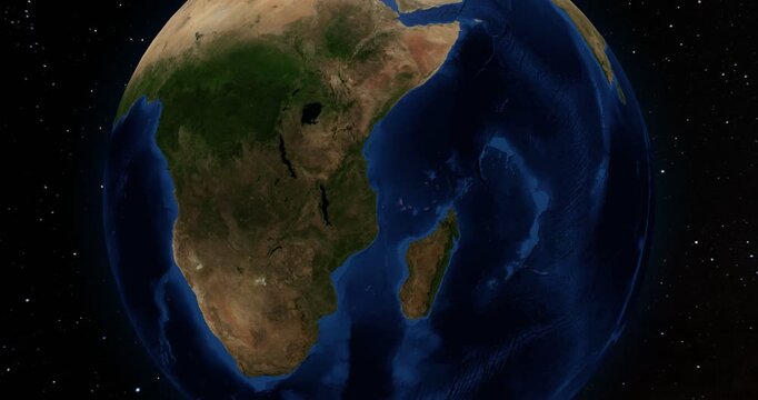 Comoros on the Globe. Zoom into the country with the Earth spinning in space. High detail physical world map with Comoros on it. Country view animation. Elements of this image furnished by NASA.