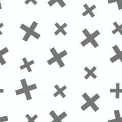 Obraz premium A repeating pattern of scattered grey crosses on a white background