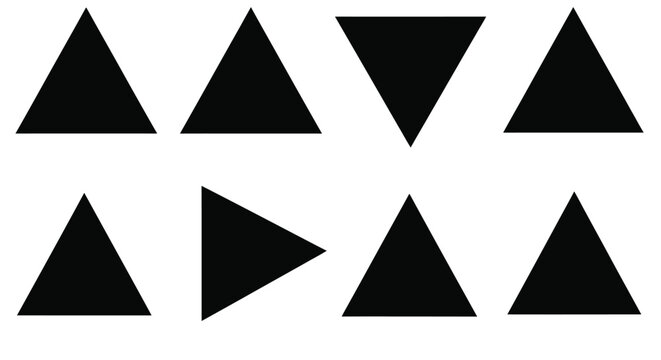 A collection of black triangles arranged on a plain white background