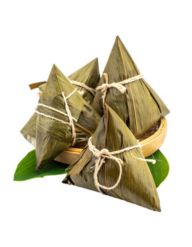Zongzi or Bacang is a sticky rice dumpling wrapped in bamboo leaves Isolated on transparent or white background