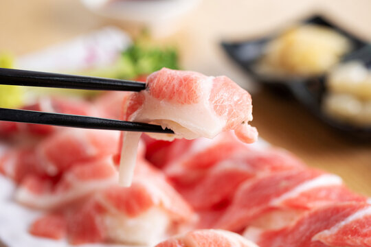 Tuna sushi on chopsticks