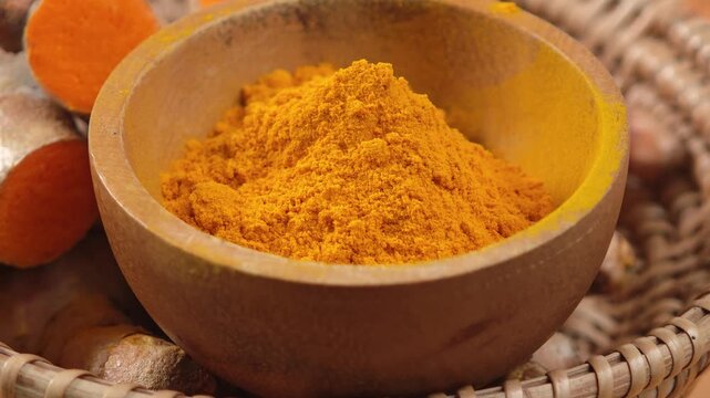 Turmeric powder in a cup.