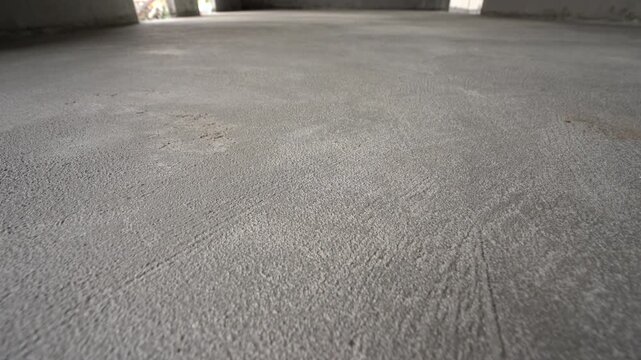 Close up of unfinished concrete floor texture at construction site