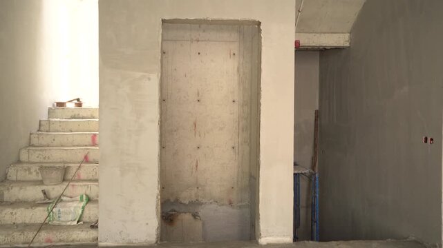 Staircase and interior wall under construction in a new building