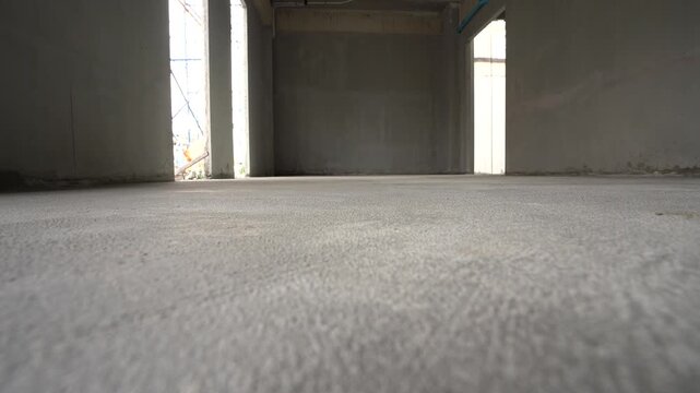 Low angle shot of fresh concrete floor at a construction site