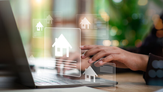 real estate agent reviews digital home listings laptop, comparing property details through online platforms, representing smart housing search, property technology, digital real estate services