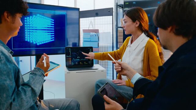 Diverse creative team of programmer develop ai assistant project together.Software engineer brainstorm about brain android robot,coding language,designer,artificial virtual intelligence with big data