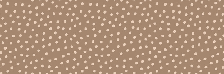 Fototapeta premium Seamless deer skin print. Fawn spots, natural fur texture. Cute baby bambi pattern. Small dot motif, mottled surface. Vector woodland animal design in neutral brown tones. Decorative textile repeat bg
