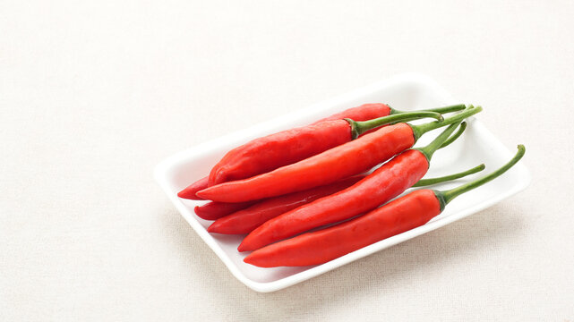 Red Chili Peppers on White Background