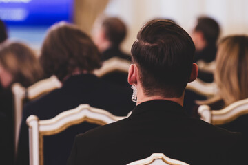 Protection and Guard Service (SPP, Romanian version of the US Secret Service) officer in public during the speech of a dignitary