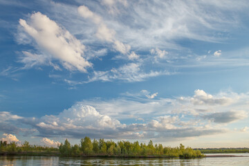 Naklejka premium Sunny summer landscape with river and field