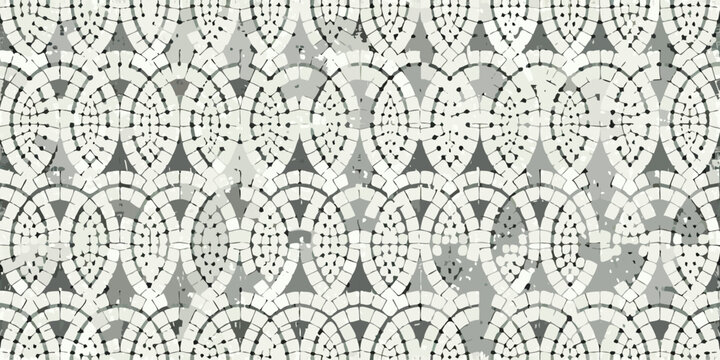 Intricate mosaic pattern featuring repeating arched and scalloped shapes
