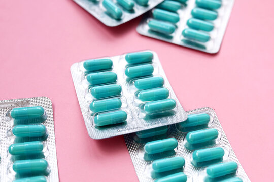 Blue capsules of Doxycycline in blister packs.