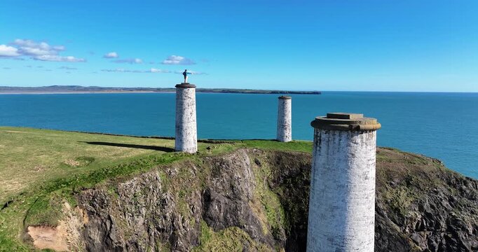 Drone flypast three pillars and Metalman Tramore Bay warning of danger to ships Waterford Ireland Epic Locations