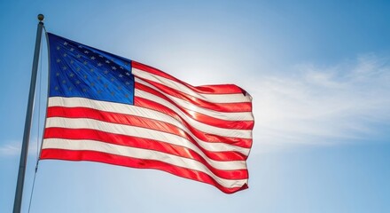 Fototapeta premium The american flag waving in the wind