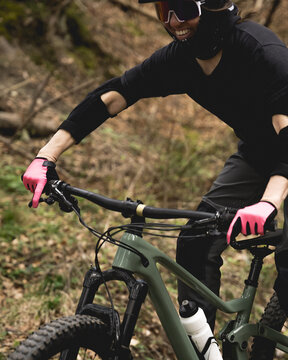 Rider adjusting settings on their bike