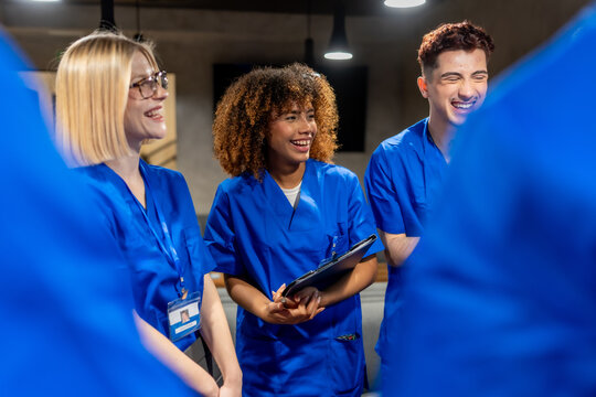 Diverse medical students enjoying group discussion and learning