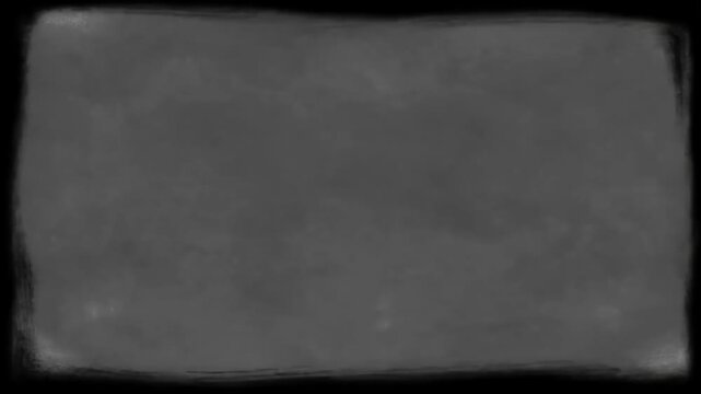 Vintage film grain flicker gray vignette background loop.