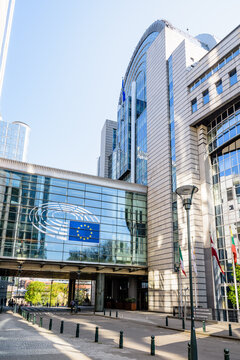 Brussels, Belgium - April 18, 2019: The Paul-Henri Spaak building, seat of the European Parliament hemicycle, is linked to a complex of parliament buildings by the Konstantinos Karamanlis bridge.