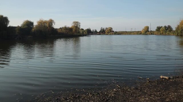 A steppe river in southern Russia, a quiet sunset hour in early autumn.