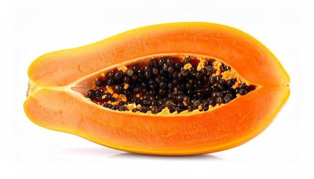Exotic papaya fruit sliced lengthwise showing numerous black seeds and orange pulp