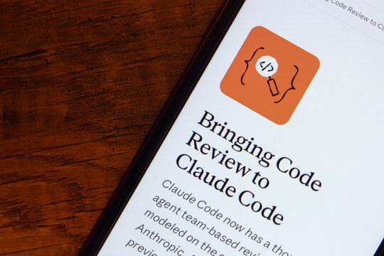 Mexico City, MEXICO - Mar 23 2026 : Smartphone showing a Claude article about code review.