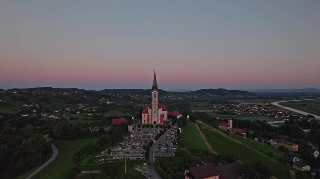 Gorca - Marijina cerkev v Malečniku - magical church near Maribor, Slovenia during sunset, Drone footage