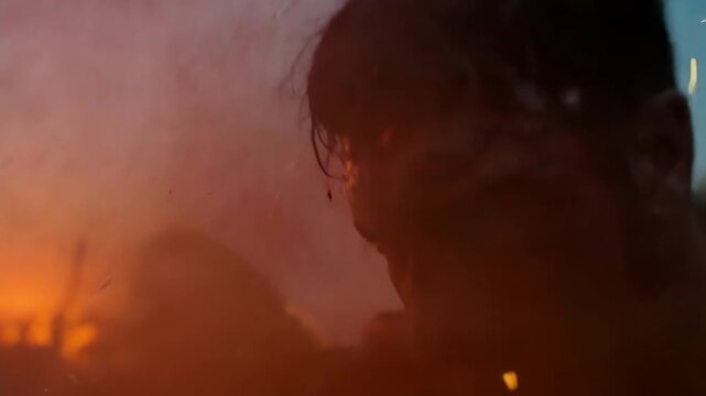 Fierce Spartan soldier lunges forward in savage battlefield melee gripping shield tightly as dust and fury surround him