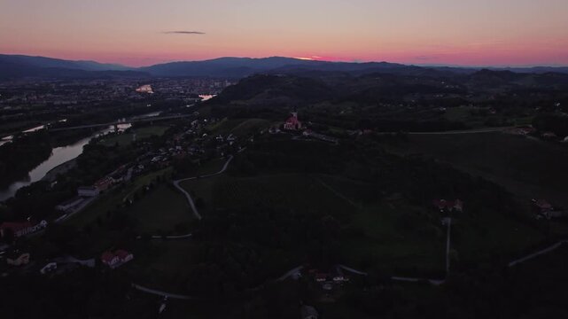Gorca - Marijina cerkev v Malečniku - magical church near Maribor, Slovenia during sunset, Drone footage