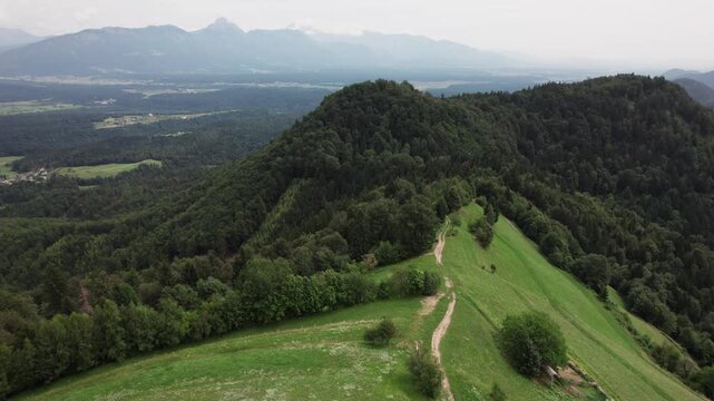 Katoli&scaron;ka cerkev Svetega Primoža in Felicijana, Slovenia - drone footage of a church on the hill with beatiful view