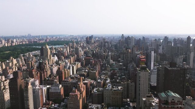 Sun-drenched skyscrapers: Aerial drone view of New York's Lenox Hill district