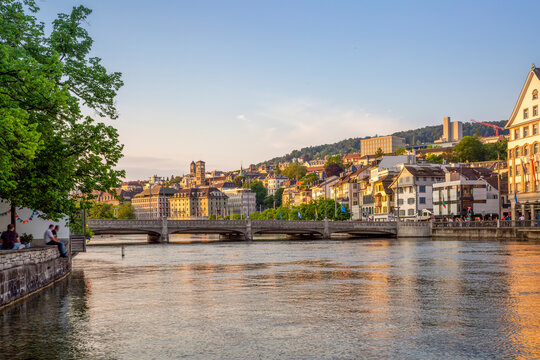 Zurich cityscape on river Limmat at sunset with Rudolf Brun Bridge