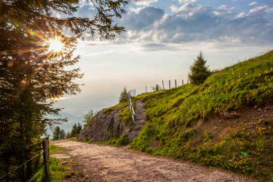 Hiking trail at sunset on Mount Rigi in Central Switzerland