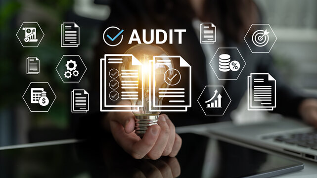 This image captures the essence of an audit in a modern business environment, showcasing a light bulb symbolizing new ideas amidst various relevant icons and documents. Ledger
