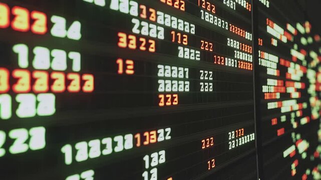 Digital data streams across a dark screen, an abstract matrix of glowing white and orange numbers flowing into the depths