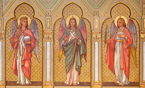 VIENNA, AUSTIRA - JUNI 17, 2021: The fresco ot Three Archangels - Raphael, Michael and Gabriel  in church Marienkirche by unknown artist from end of 19. cent.