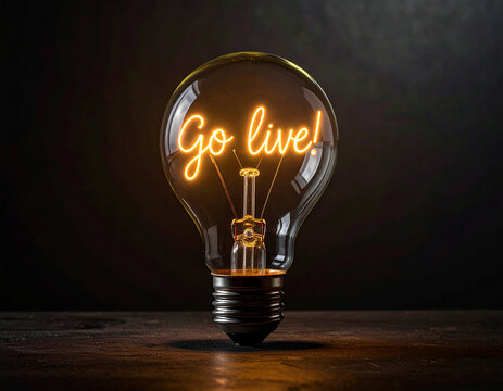 Glühbirne mit einem Glühdraht das aussieht wie das Wort "Go live!