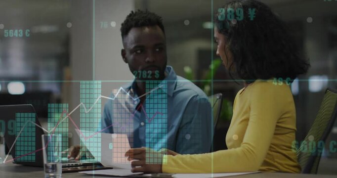Woman showing sheet to man, reviewing laptop while data charts overlaying docs for finance review