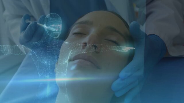 Patient, clinician cradling and probing, activating hologram scan tracing jawline for medical exam