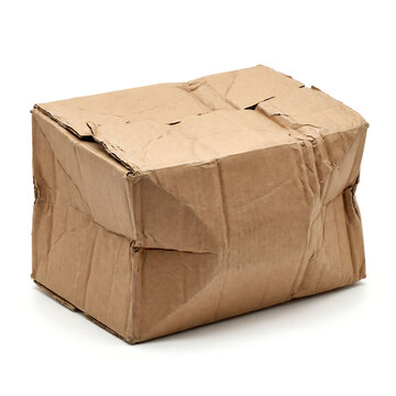 Collapsed rectangular shipping box with heavy structural damage