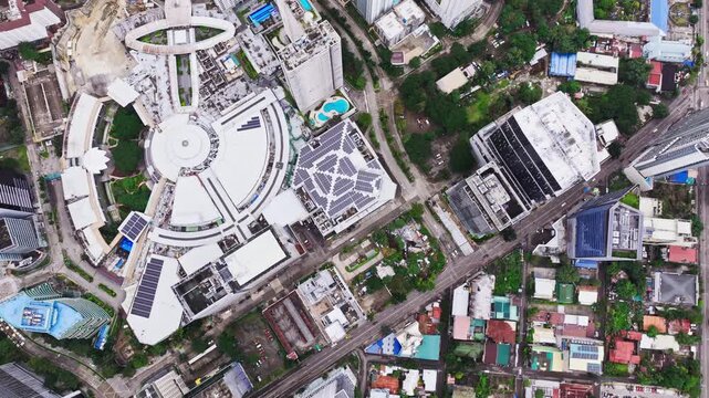 High altitude drone top down view, large shopping mall, city streets Cebu City