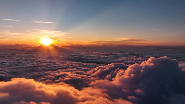 Sunrise above clouds from high altitude