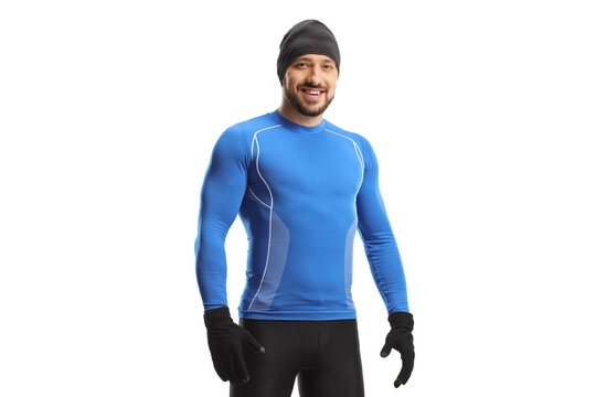 Sporty fit man in running clothes and a hat