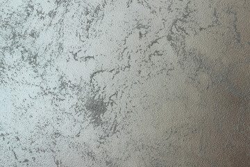 Rough weathered metallic gray surface background displaying distressed grunge texture pattern © reddish