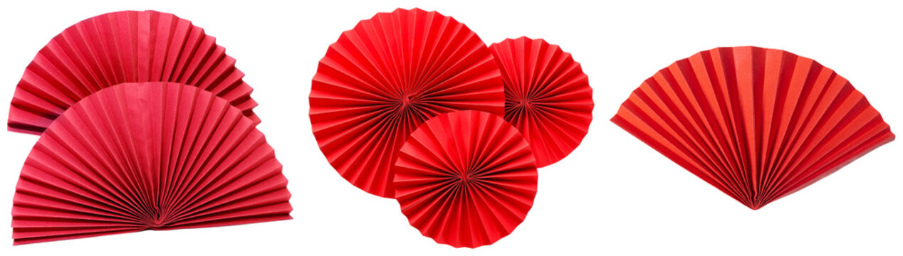 Vibrant red paper folding fans and decorative medallions, arranged in various formations.