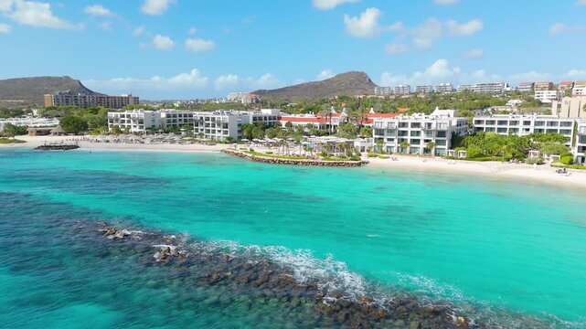 Aerial drone shot showing tropical Caribbean coastline and calm sea near Marriott Beach in Curacao