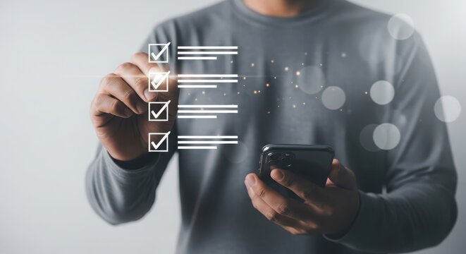 A person checks a list on a phone