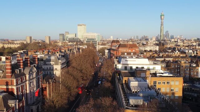 Sunny urban aerial of Marylebone Road and London skyline with the BT Tower, United Kingdom, showing cars, famous landmarks, residential buildings on clear day