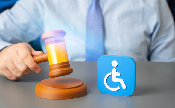 Court decision on granting or revoking disability status. Benefits and rights under new laws, legal review and social protection mechanism. Man holding judge's hammer near disabled person icon