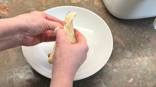 cleaning boiled cod fish